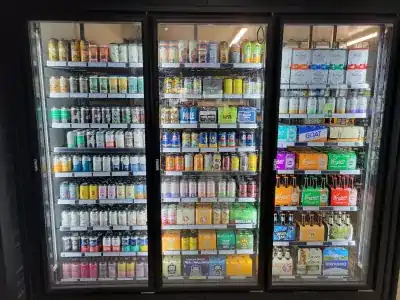 Refrigerated drinks display inside Bailey Bottle Shop